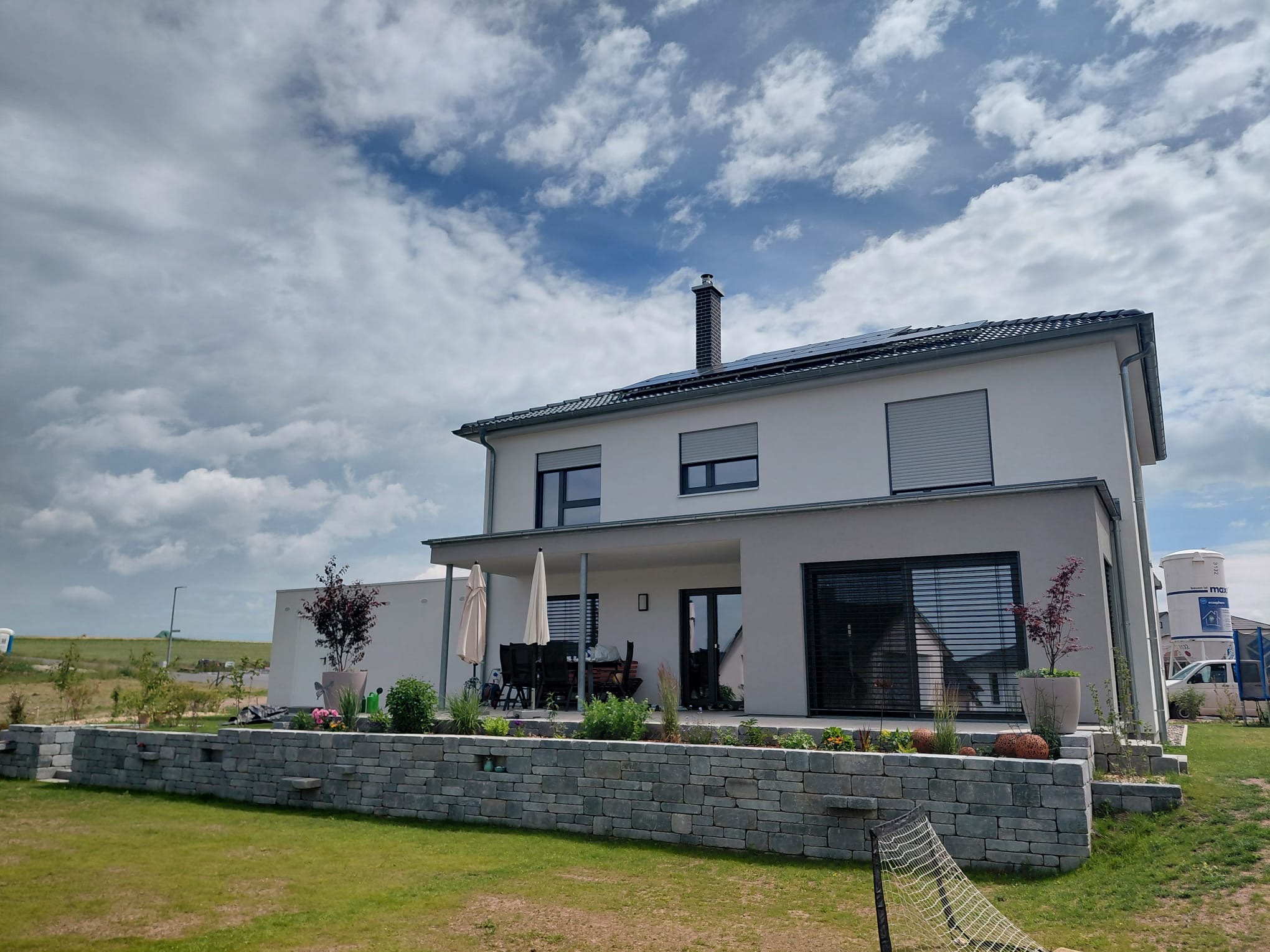 Haus mit Trockenmauer Galabau Friedel
